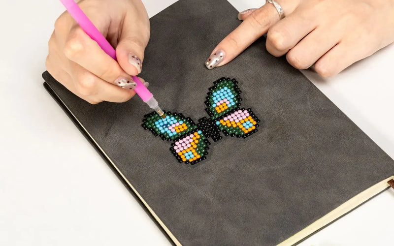 Make diamond painting on the book